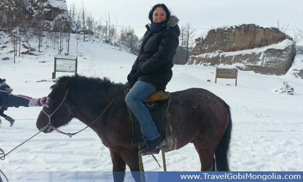 horse riding in winter in Mongolia