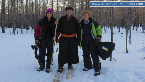 our 2 customers are with a reindeer herder man in north Mongolia