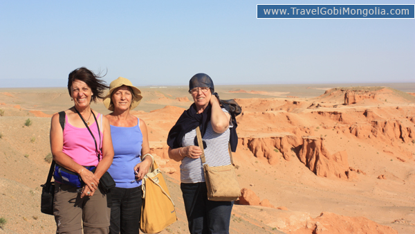 Our three tourists are in Bayanzag. Gobi Desert Tours From Ulaanbaatar By Flight