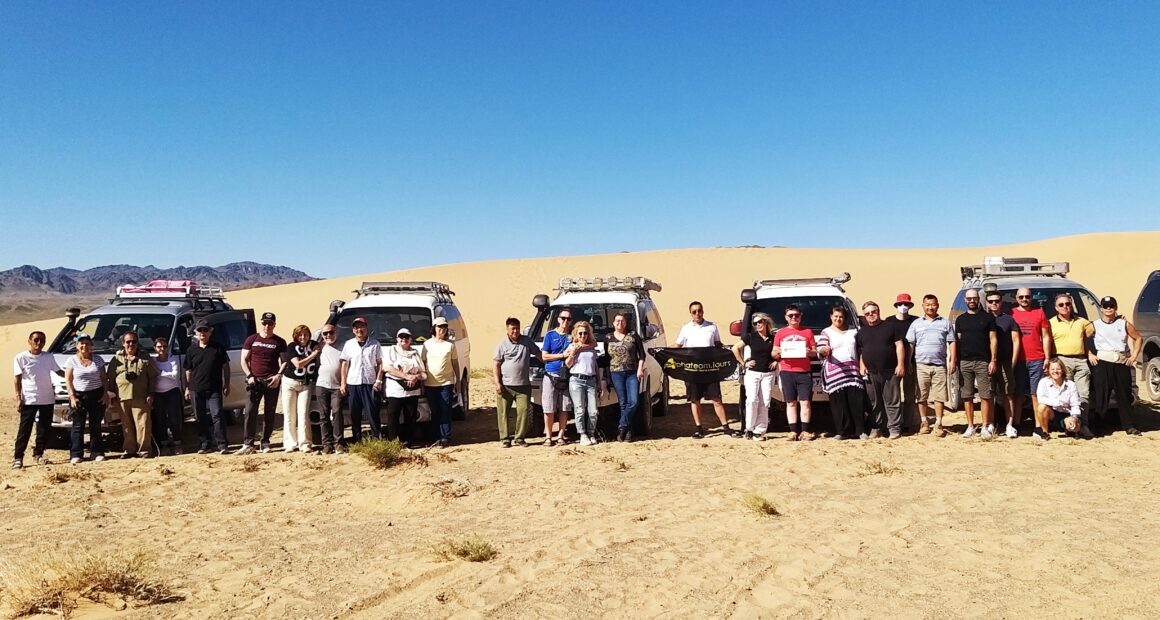 Our travelers are traveling in Gobi. Near the sand dunes of Khongor Sand Dune. Mongolia Travel