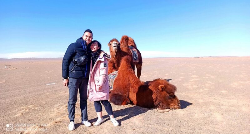 2 of our clients from Hong Kong are with camels in Gobi. April 2023.