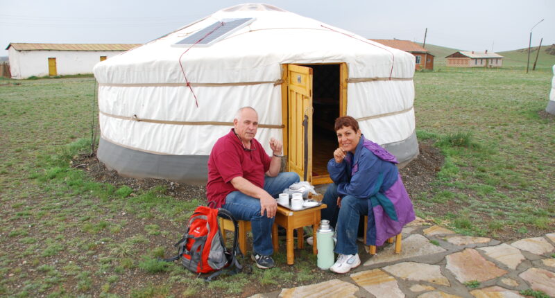 Customers from Israel drinking tea in front of their ger