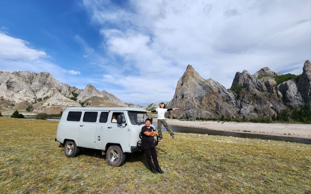 Our customer & our guide are with thier travel vehicle Russian van purgon in North Mongolia