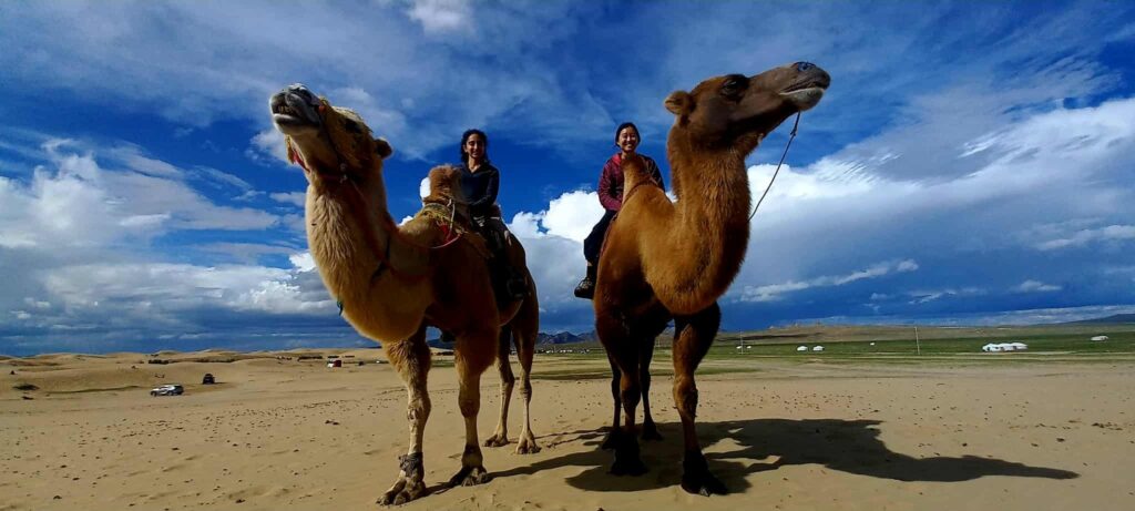 our customers are riding camels at Elsen Tasarkhai Sands